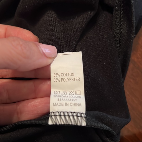 Sexy Black bodysuit with seven snap buttons in front. Long sleeve. Never worn. - Picture 5 of 5